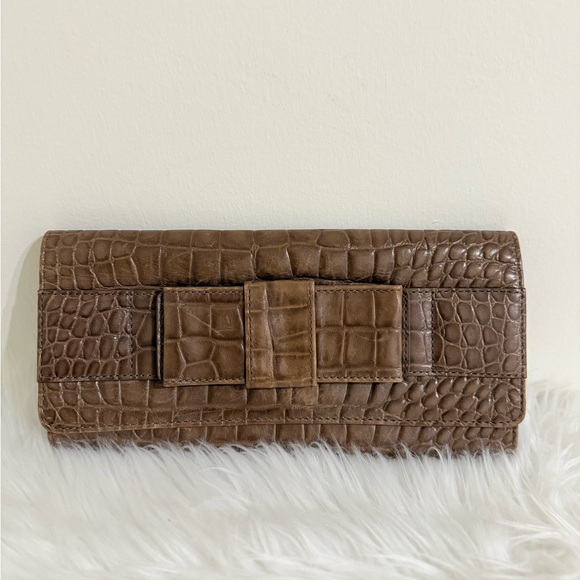 Michael Kors Handbags - Michael Kors Embossed Leather Clutch